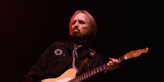 DOVER, DE - JUNE 22: Tom Petty performs onstage at the Firefly Music Festival at The Woodlands of Dover International Speedw