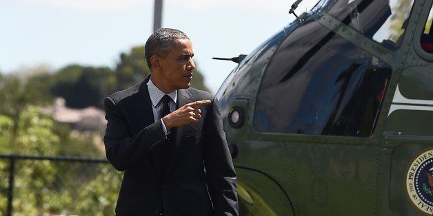 US President Barack Obama arrives in Los Altos Hills, California, on July 23, 2014. Obama is in California to attend fundriser events. AFP PHOTO/Jewel Samad (Photo credit should read JEWEL SAMAD/AFP/Getty Images)