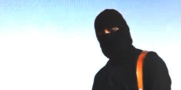 This still image from an undated video released by Islamic State militants on Tuesday, Aug. 19, 2014, purports to show journa
