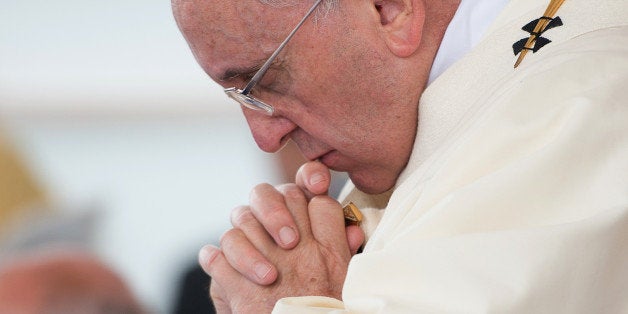 In this picture made available by the Vatican newspaper L'Osservatore Romano, Pope Francis celebrates an open-air mass at Italy's largest war memorial, in Fogliano Redipuglia, northern Italy, Saturday, Sept. 13, 2014. Pope Francis urged the world Saturday to shed its apathy in the face of what he characterizes as a third world war, intoning "war is madness" at the foot of a grandiose monument to soldiers killed in World War I. The pope's paternal grandfather fought in Italy's 1915-17 offensive against the Austro-Hungarian empire waged in the nearby battlefields, surviving to impress upon the future pope the horror of war. (AP Photo/L'Osservatore Romano, ho)