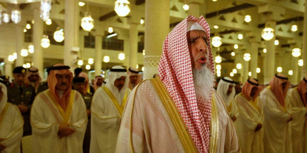 Sheikh Abdul Aziz al-Sheikh, the Saudi grand mufti, prays at the Imam Turki bin Abdullah mosque during Eid al-Fitr morning pr