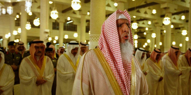 Sheikh Abdul Aziz al-Sheikh, the Saudi grand mufti, prays at the Imam Turki bin Abdullah mosque during Eid al-Fitr morning prayers in Riyadh, Saudi Arabia, Thursday, Sept. 9, 2010. Muslims pray celebrating Eid al-Fitr, marking the end of the holy lunar month of Ramadan following a month fasting between daybreak and sunset. (AP Photo/Hassan Ammar)