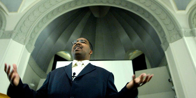 DENVER, COLORADO--FEBRUARY 28, 2007-ABOVE: Ephren Taylor addresses a lunchtime audience at St. Cajetan's Church on the Aurar