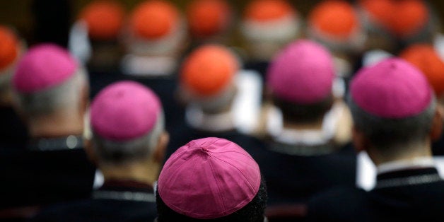 Bishops and Cardinals attend a morning session of a two-week synod on family issues at the Vatican, Monday, Oct. 13, 2014. (AP Photo/Gregorio Borgia)