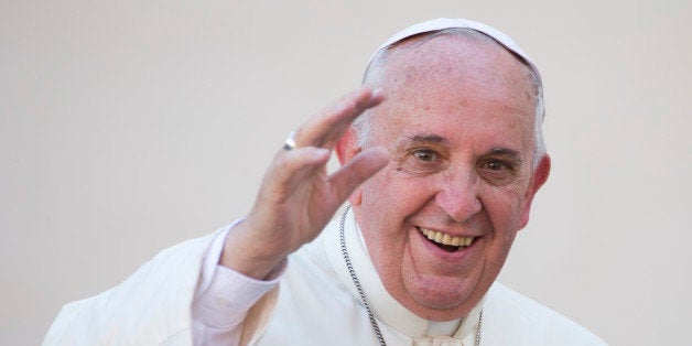 Pope Francis waves as he leaves after he celebrated the beatification ceremony of Pope Paul VI, and a mass for the closing of of a two-week synod on family issues, in Saint Peter's Square at the Vatican, Sunday, Oct. 19, 2014. (AP Photo/Andrew Medichini)