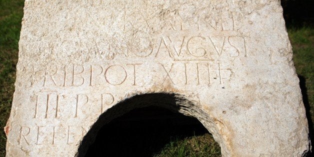 A 2,000-year-old commemorative stone inscription dedicated by the Roman army to Roman Emperor Hadrian, is seen in east Jerusalems Rockefeller museum on October 21, 2014. The stone, which measures a metre by a metre-and-a-half(three feet by five feet)and weighing a tonne, was found near Jerusalem's Old City's Damascus Gate and has been called 'among the most important Latin inscriptions' discovered in the Holy City as it sheds light on the ancient Jewish revolt against the Roman Empire. AFP PHOTO/MENAHEM KAHANA (Photo credit should read MENAHEM KAHANA/AFP/Getty Images)