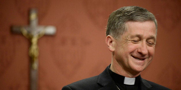 Newly appointed Archbishop of Chicago, Archbishop Blase Cupich speaks to the media after it was announced that he would replace Cardinal Francis George, retiring leader of the Chicago Catholic Archdiocese during a news conference in Chicago, Saturday, Sept. 20, 2014. (AP Photo/Paul Beaty)