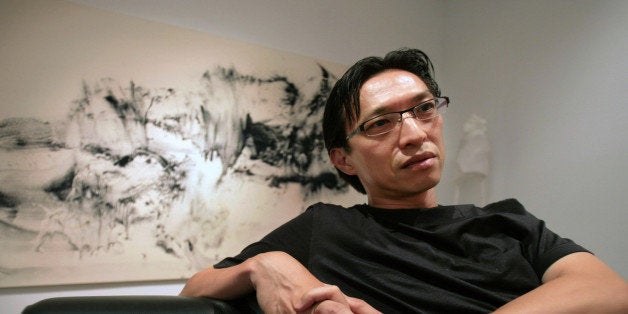 ** ADVANCE FOR FRIDAY AMS, JULY 27 **Artist Mako Fujimura poses in front of his work "Water Stones III" at the Sara Tecchia R