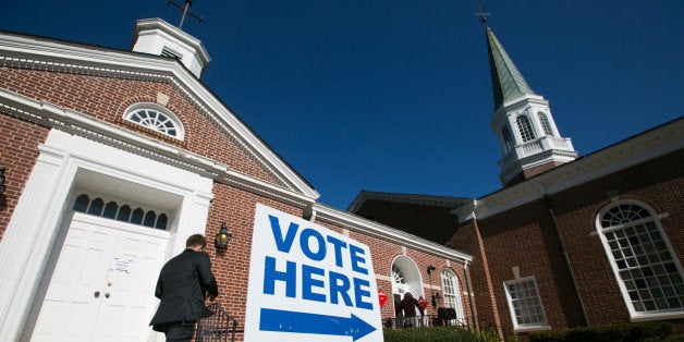 DECATUR, GA - NOVEMBER 4: Voters turn out to cast their ballots for the midterm election at First Christian Church of Decatur on November 4, 2014 in Decatur, Georgia. Georgia Democratic U.S. Senate candidate Michelle Nunn is running in a tight race against Republican U.S. Senate candidate David Perdue. (Photo by Jessica McGowan/Getty Images)