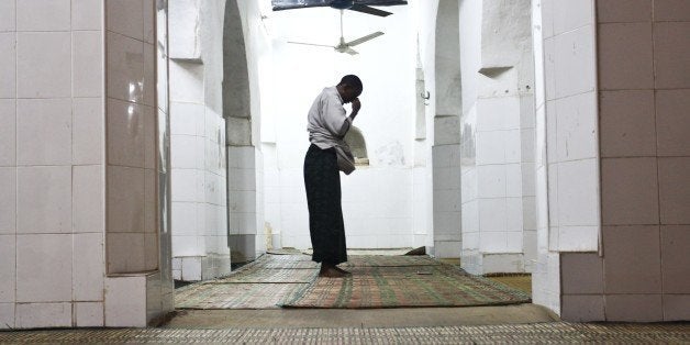 LAMU ISLAND, KENYA FEBRUARY 8: (SOUTH AFRICA OUT) A man is seen during even prayers in one of Lamu Old Town's many beautiful