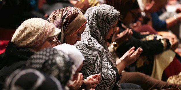 WASHINGTON, DC - NOVEMBER 14: Muslims participate in a Friday prayer November 14, 2014 at the National Cathedral in Washington, DC. Members of five Muslim communities joined the very first Muslim Friday prayer, also known as jumu'ah, held at the cathedral today. (Photo by Alex Wong/Getty Images)