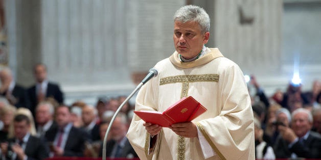 In this photo taken on Sept.19, 2013 provided by the Vatican newspaper L'Osservatore Romano, Vatican Almoner, Archbishop Konrad Krajewski attends the ceremony for his episcopal ordination, in St. Peter's Basilica, at the Vatican. The existence of the Vatican Almoner dates back centuries: It is mentioned in a papal bull from the 13th-century Pope Innocent III, and Pope Gregory X, who ruled from 1271-1276, organized it into an official Holy See office for papal charity. Up until Krajewski came along, the almoner was typically an aging Vatican diplomat who was serving his final years before being allowed to retire at age 75. Francis changed all that, tapping the 50-year-old Pole to be a more vigorous, hands-on extension of himself. The almoner's duties are two-fold: carrying out acts of charity, and raising the money to fund them. (AP Photo/L'Osservatore Romano, ho)