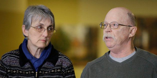 Ed and Paula Kassig, parents of Peter Kassig, speak during a news conference Monday, Nov. 17, 2014, in Indianapolis. Peter Kassig was captured Oct. 1, 2013, while delivering aid in Syria through a relief organization he founded. The White House confirmed Peter Kassig's death Sunday, Nov. 16 after the Islamic State group released a video showing that Kassig had been beheaded. (AP Photo/Darron Cummings)