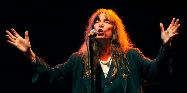 Patti Smith performs onstage at The Wiltern on Friday, Oct. 12, 2012, in Los Angeles. (Photo by Chris Pizzello/Invision/AP)