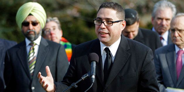 Rev. Gabriel Salguero, speaks during a news conference, with other religious leaders to remember the lives lost in Newtown, Conn., at Washington National Cathedral on Friday, Dec. 21, 2012. Interfaith religious leaders brought together by the Religious Action Center of Reform Judaism and Washington National Cathedral, to honor the lives of those lost in Newtown, Conn., by insisting that Congress and the President continue to act swiftly to end the national epidemic of gun violence. (AP Photo/Jose Luis Magana)