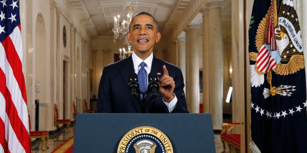 U.S. President Barack Obama speaks during a news conference in Washington, D.C., U.S., on Thursday, Nov. 20, 2014. Obama said hell defer deportations and open the chance of better jobs for about 5 million undocumented immigrants, ending months of build-up and initiating a showdown with congressional Republicans. Photographer: Jim Bourg/Pool via Bloomberg 