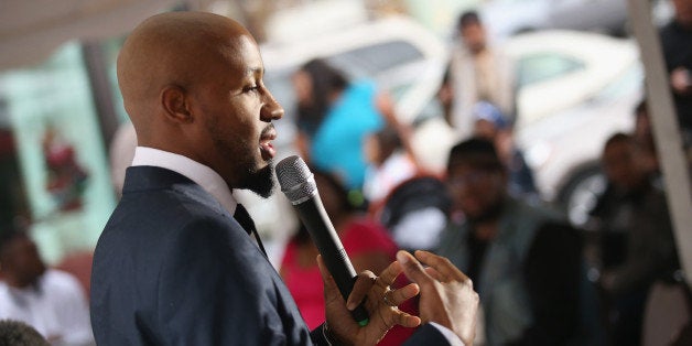 FERGUSON, MO - NOVEMBER 30: Carlton Lee delivers a sermon at The Flood Christian Church on November 30, 2014 in Ferguson, Mi