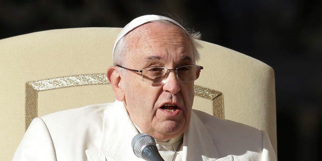 Pope Francis speaks during his weekly general audience in St. Peter's Square at the Vatican, Wednesday, Dec. 10, 2014. (AP Photo/Gregorio Borgia)