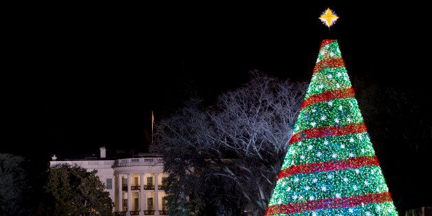 The 2014 National Christmas Tree stands near the White House during the lighting ceremony at the Ellipse in Washington, Thursday, Dec. 4, 2014. (AP Photo/Carolyn Kaster)