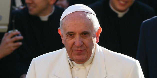 VAYICAN CITY, VATICAN - DECEMBER 17: Pope Francis looks on during his general audience at St Peter's square on December 17, 2014 at the Vatican. People gather today in St Peter's square to celebrate Pope Francis 78th birthday at the end of the audience. (Photo by Evren Atalay/Anadolu Agency/Getty Images)