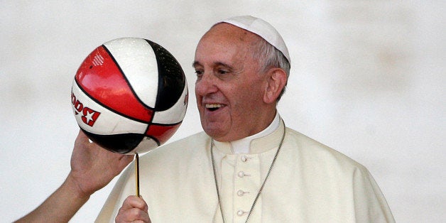 ope Francis keeps the balance of a ball during a meeting with the members of the Italian Sports Center in St. Peter's Square at the Vatican Saturday, June 7, 2014. (AP Photo/Gregorio Borgia)