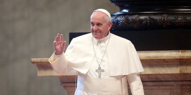 VATICAN CITY, VATICAN - DECEMBER 19: Pope Francis attends a meeting with managers and athletes of CONI Italy's National Olympic Committee during a celebration at St. Peter's Basilica on December 19, 2014 in Vatican City, Vatican. The Pope congratulated Rome's candidacy as a possible venue for the 2024 Olympics, but quipped; 'I won't be here!' (Photo by Franco Origlia/Getty Images)