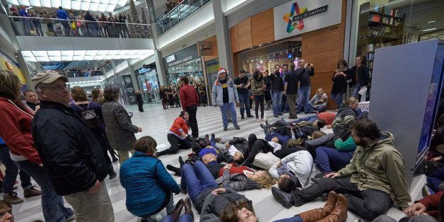 BLOOMINGTON, MN - DECEMBER 20: Thousands of protesters from the group 'Black Lives Matter' disrupt holiday shoppers on December 20, 2014 at Mall of America in Bloomington, Minnesota. (Photo by Adam Bettcher/Getty Images)