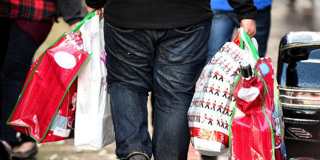 GLASGOW, UNITED KINGDOM - DECEMBER 19: Shoppers look for Christmas gifts on the high street on December 19, 2014 in Glasgow,