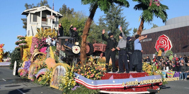 The United Sikh Mission float "A Sikh-American Journey," featuring a replica of their 100-year-old place of worship in Stockton, Calif., appears during the 126th Rose Parade in Pasadena, Calif., Thursday, Jan. 1, 2015. (AP Photo/Ringo H.W. Chiu)