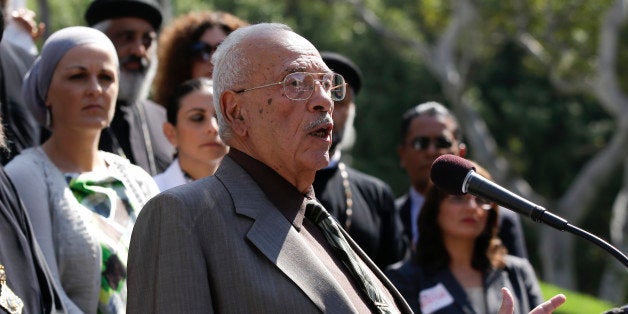 Dr. Maher Hathout, Senior Adviser of the Muslim Public Affairs Council speaks during a news conference in Los Angeles, Monday, Sept. 17, 2012 to condemn all violent reactions that have been playing out over the past several days in the Middle East. (AP Photo/Chris Carlson)