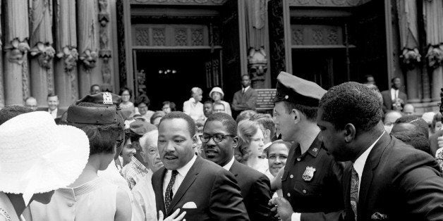 UNITED STATES - AUGUST 08: Dr. Martin Luther King Jr. speaks to the press outside of Riverside Chruch after preaching the mo