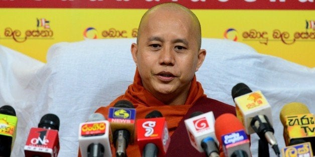 Myanmar Buddhist monk Ashin Wirathu addresses a press conference in Colombo on September 30, 2014. A controversial Buddhist cleric from Myanmar announced September 28 he is linking up with hardline monks in Sri Lanka, alleging that their religion is under threat from Islamic jihadists. AFP PHOTO / LAKRUWAN WANNIARACHCHI (Photo credit should read LAKRUWAN WANNIARACHCHI/AFP/Getty Images)