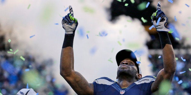 Seattle Seahawks' Ricardo Lockette celebrates after during overtime of the NFL football NFC Championship game against the Green Bay Packers Sunday, Jan. 18, 2015, in Seattle. The Seahawks won 28-22 to advance to Super Bowl XLIX. (AP Photo/Ted S. Warren)