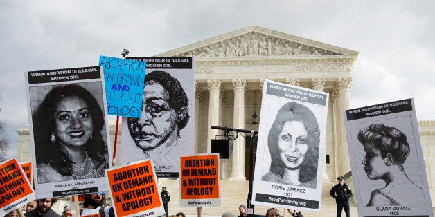UNITED STATES - JANUARY 22: Pro-choice protesters chant in front of the Supreme Court on Thursday, Jan. 22, 2015, the anniversary of the Roe v Wade abortion decision. (Photo By Bill Clark/CQ Roll Call)