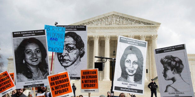 UNITED STATES - JANUARY 22: Pro-choice protesters chant in front of the Supreme Court on Thursday, Jan. 22, 2015, the anniversary of the Roe v Wade abortion decision. (Photo By Bill Clark/CQ Roll Call)