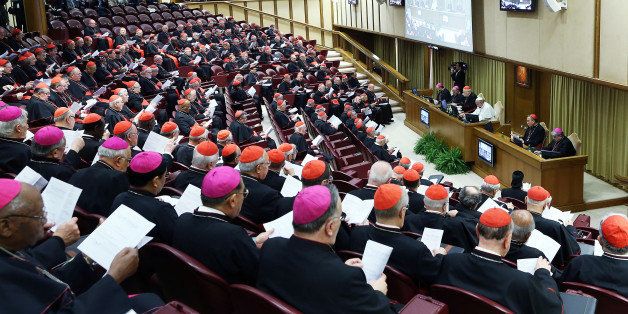 VATICAN CITY, VATICAN - FEBRUARY 12: Pope Francis attends the opening session of the Extraordinary Consistory for the creation of new cardinals at the Synod Hall on February 12, 2015 in Vatican City, Vatican. Pope Francis summoned cardinals from around the world to help carry out his mandate to reform the Vatican's central government , or Curia, by proposing reforms to encourage greater harmony, collaboration and transparency. (Photo by Franco Origlia/Getty Images)