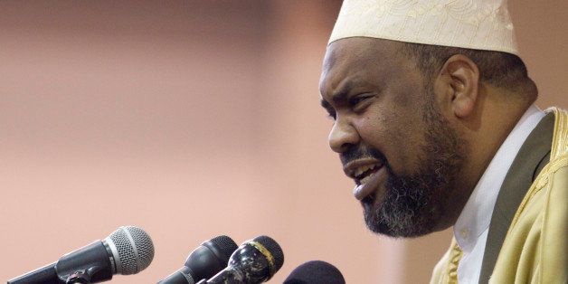 Imam Mohamed Magid, Executive Director of the All Dulles Area Muslim Society (ADAMS), speaks at a gathering of Washington-area Muslims at ADAMS, a suburban mosque in Sterling, Va., Friday, Feb. 24, 2012. A senior Pentagon official apologized multiple times for the âunknowingly and improperlyâ burned Qurans at a U.S. military base in Afghanistan, and Magid called on Muslims to respond peacefully and with tolerance. (AP Photo/Carolyn Kaster)