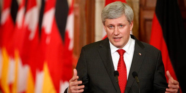 OTTAWA, CANADA -FEBRUARY 09: Canada's Prime Minister Stephen Harper addresses media alongside German Chancellor Angela Merkel (not seen) on Parliament Hill in Ottawa, Canada on February 9, 2015. (Photo by Cole Leighton/Anadolu Agency/Getty Images)