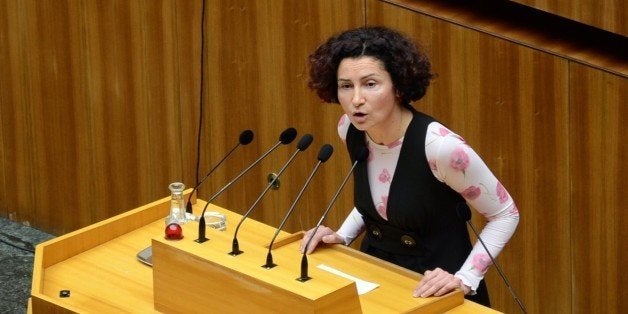 VIENNA, AUSTRIA - FEBRUARY 25: Alev Korun, Turkish congresswoman in the Austrian Parliament, delivers a speech when deputies discuss on Austrian Islam bill at Austrian Parliament in Vienna on February 25, 2015. Bill aims to prohibit foreign funding for Islamic organizations in Austria as well as impose other restrictions. (Photo by Hasan Tosun/Anadolu Agency/Getty Images)