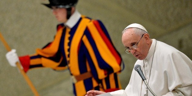 Pope Francis speaks on February 28, 2015 during an audience with Italian members of Confederation of Cooperatives at the Vatican . AFP PHOTO / TIZIANA FABI (Photo credit should read TIZIANA FABI/AFP/Getty Images)