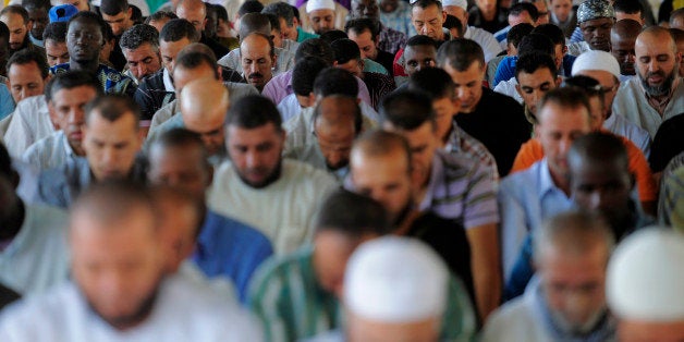 Muslims offer prayers on the last Friday of Ramadan in Lleida, Spain, Friday, Sept. 10, 2010. (AP Photo/Manu Fernandez)