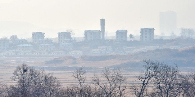 North Korea's propaganda village of Gijungdong is seen from a South Korean military check point of the truce village of Panmunjom in the Demilitarized Zone dividing the two Koreas on February 4, 2015. North Korea appeared to rule out any resumption of dialogue with the United States, threatening to react to any US 'war of aggression' with nuclear strikes and cyber warfare. AFP PHOTO / JUNG YEON-JE (Photo credit should read JUNG YEON-JE/AFP/Getty Images)