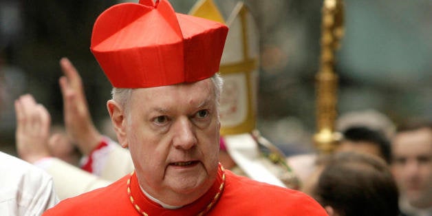 Archbishop Emeritus of New York Edward Egan makes his way into St. Patrick's Cathedral for the celebration of the first Mass by the new Archbishop of New York, Timothy Michael Dolan, in New York, Wednesday, April 15, 2009. AFP PHOTO/POOL/Seth Wenig (Photo credit should read Seth Wenig/AFP/Getty Images)