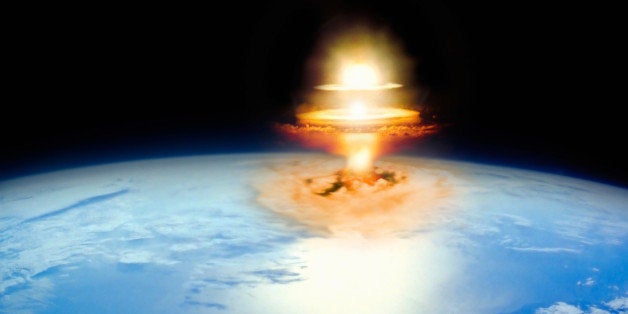 Planet earth with atomic blast