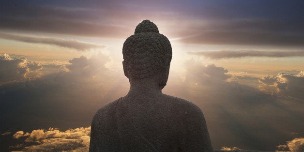 Glowing buddha, The Buddhist Temple of Borobudur, Java, Indonesia