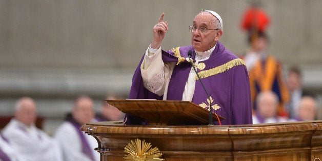 Pope Francis speaks during a penitential ceremony on March 13, 2015 at St Peter's basilica in Vatican. Pope Francis declared an extraordinary jubilee year to celebrate the 50th anniversary of a landmark Vatican council and said the Church was bound to continue its reforming work. The year will be dedicated to the theme of mercy and begin on December 8th, the date the Vatican II council closed in 1965, Francis said in St Peter's cathedral on the second anniversary of his election as pope. AFP PHOTO / ALBERTO PIZZOLI (Photo credit should read ALBERTO PIZZOLI/AFP/Getty Images)