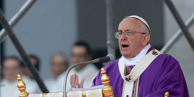 Pope Francis celebrates a Mass in Naples, Italy, Saturday, March 21, 2015. Pope Francis made an impassioned defense of the unemployed during a speech to people in the poor Neapolitan neighborhood of Scampia Saturday. (AP Photo/Gregorio Borgia)