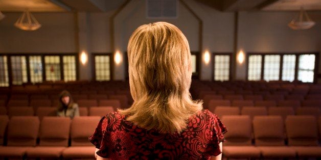 Woman at the front of an empty room