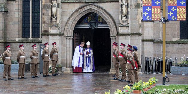 LEICESTER, UNITED KINGDOM - MARCH 26: Archbishop of Canterbury Justin Welby waits at the entrance to Leicester Cathedral for the reinterment ceremony of King Richard III, on March 26, 2015 in Leicester, England. The skeleton of King Richard III was discovered in 2012 benaeth a car park, in the foundations of Greyfriars Church in Leicester, 500 years after he was killed in the Battle of Bosworth Field. (Photo by Richard Pohle - WPA Pool/Getty Images)
