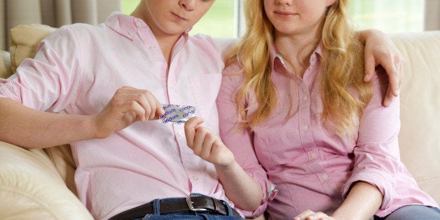 Boyfriend and girlfriend with condom